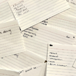 handwritten notecards from EMT students defining the qualities they want in an EMT